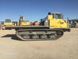 Side of used Crawler Carrier in yard